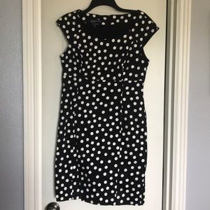 Black and white polka dot sheath dress.